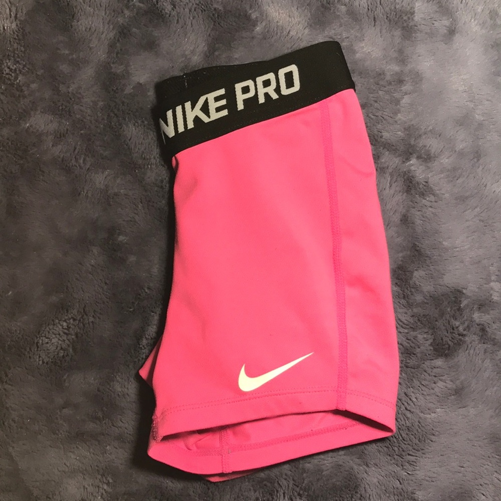 Pink Nike pros youth small